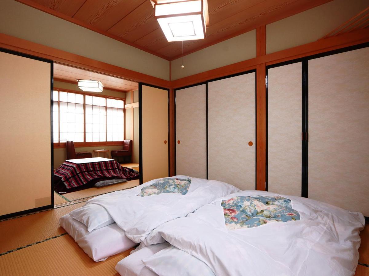 Hotel Minshuku Kojima à Nozawaonsen Extérieur photo