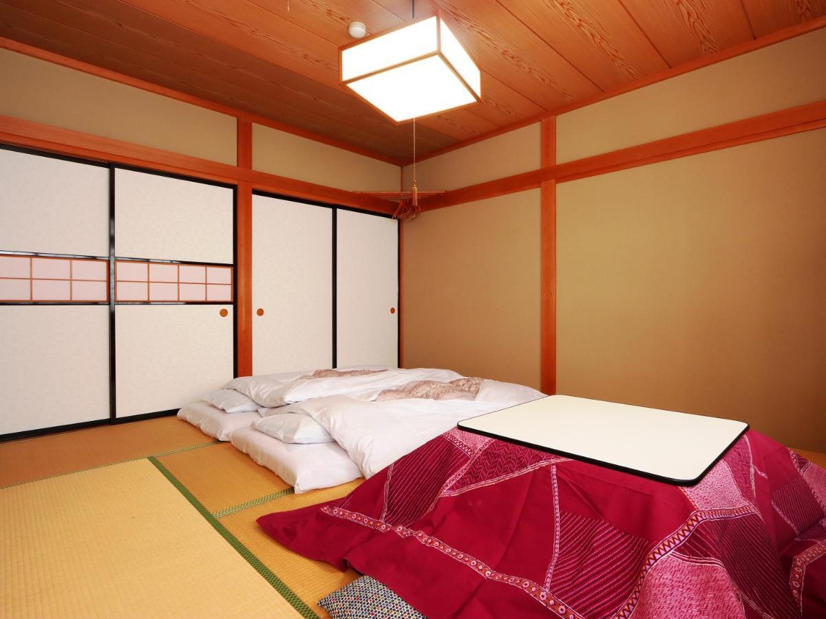 Hotel Minshuku Kojima à Nozawaonsen Extérieur photo