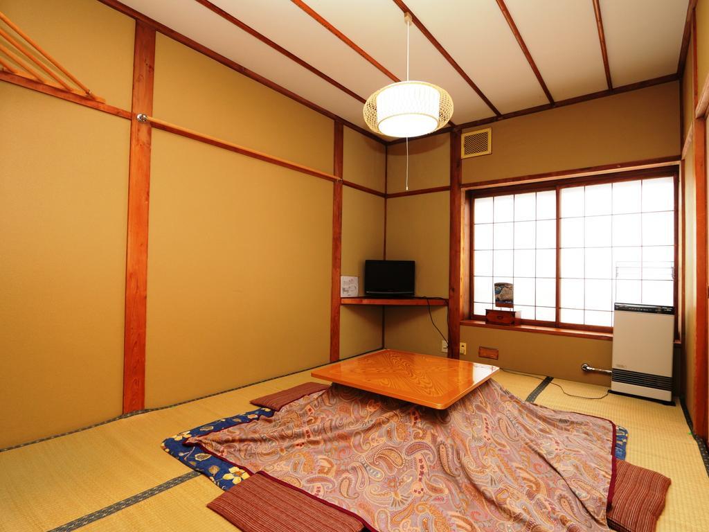 Hotel Minshuku Kojima à Nozawaonsen Extérieur photo